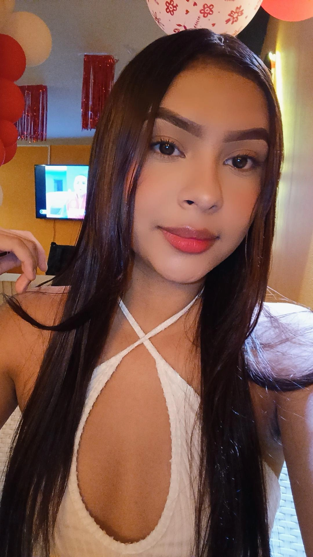 A woman from Colombia on camera, one of the girls you could meet on MeetCamChat